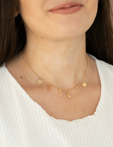 Love Conquers All Gold Necklace and Earrings