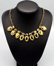 Load image into Gallery viewer, Extra Enticing Brass Necklace and Earrings
