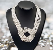 Load image into Gallery viewer, Knotted Knockout Silver Necklace and Earrings

