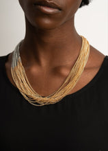 Load image into Gallery viewer, Metallic Merger Gold and Silver Necklace and Earrings
